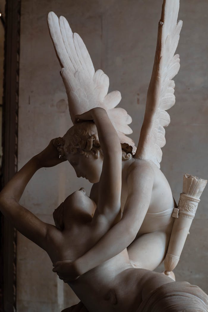 Classic sculpture 'Psyche Revived by Cupid's Kiss' in the Louvre Museum, Paris.
